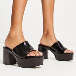 Public Desire plataform mules in black patent